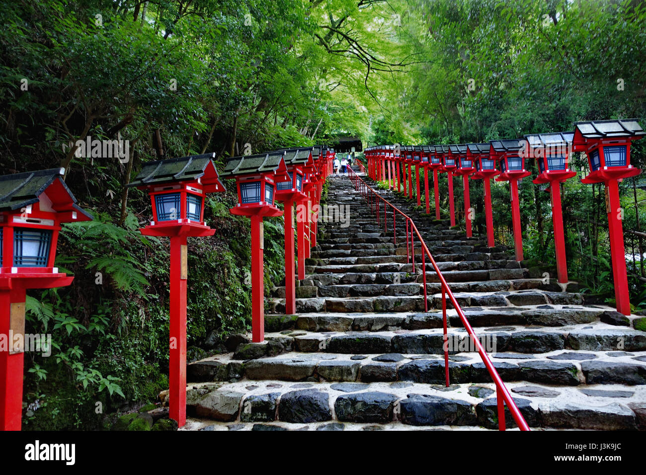 Red Light Poles continued staircase entrance to  Kibune-jinja shrine, Kyoto, Japan. Selective focus. Stock Photo