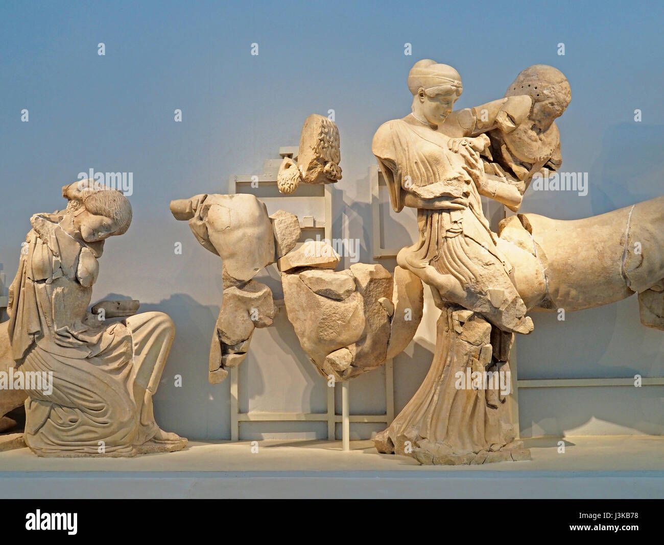 Battle of Lapiths and Centaurs sculptures from Temple of Zeus in the Olympia Museum. Stock Photo