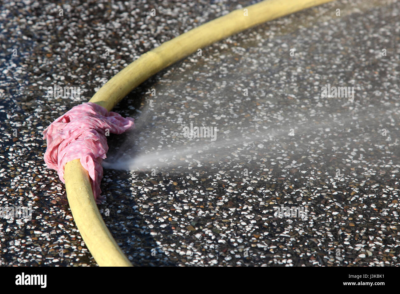 defective water hose with cloth patch Stock Photo Alamy