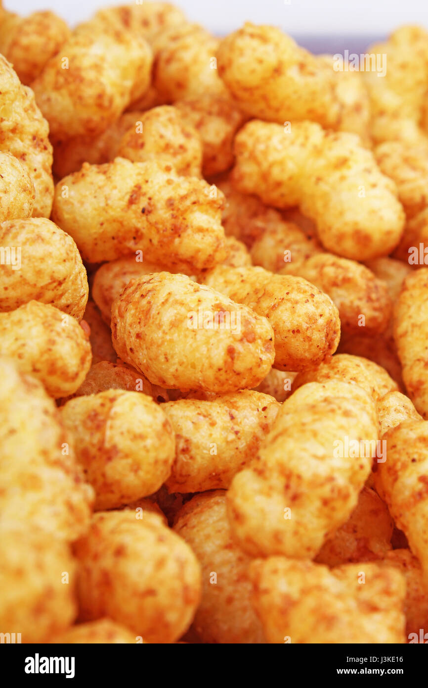 Cheese puff. Cheese puffs snack background texture food pattern Stock Photo Alamy