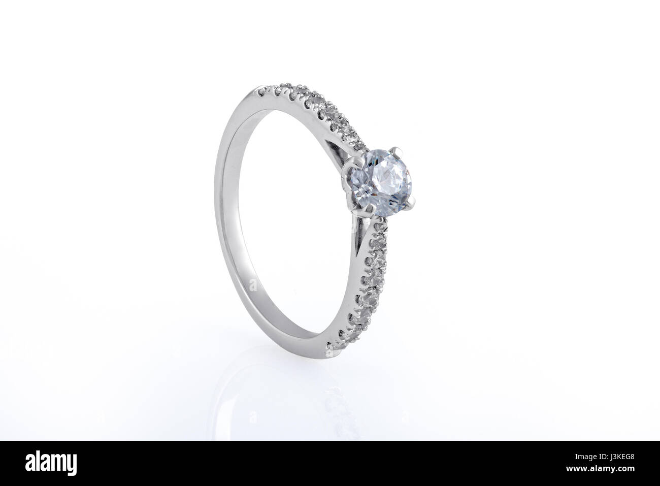 White Gold Wedding, Engagement Rings with Diamonds on white background Stock Photo