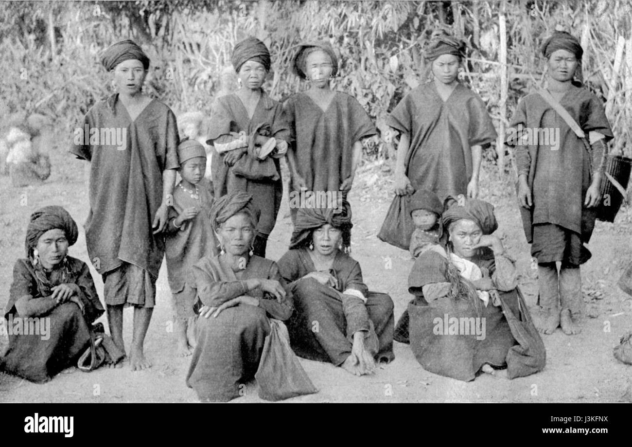 This image shows a group of villagers from the Taung Thu, also known as Pa O, ethnic group. They are an indigenous group from Myanmar, and the image highlights their traditional attire and lifestyle. Stock Photo