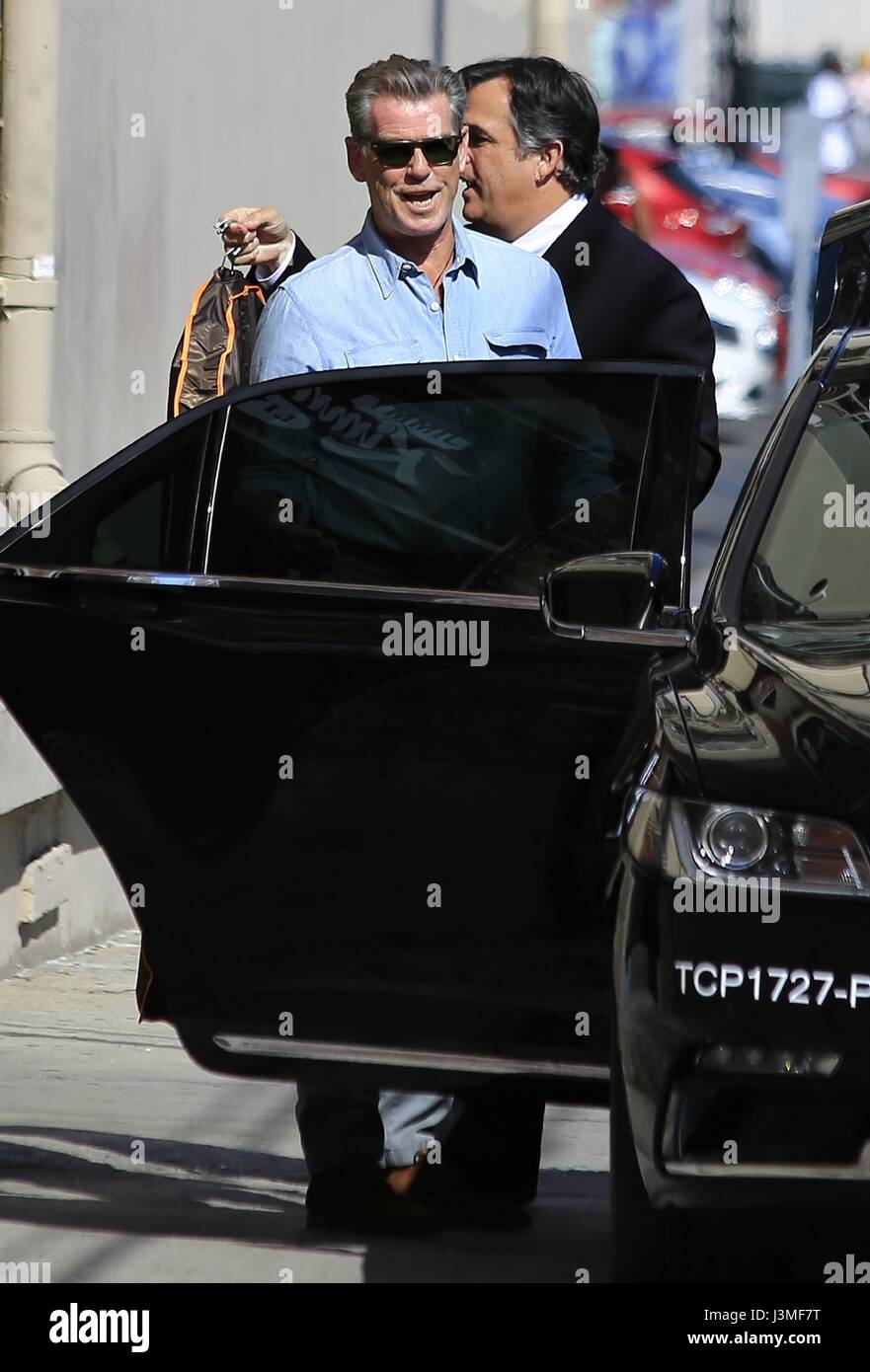 Pierce Brosnan arrives at 'Jimmy Kimmel Live!' studios and stops to sign autographs Featuring