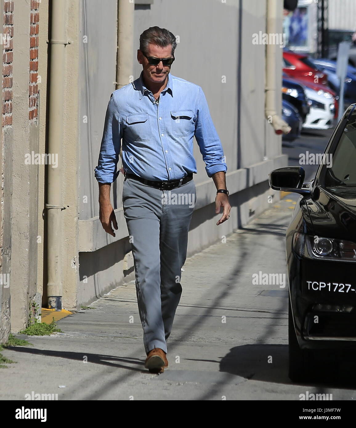 Pierce Brosnan arrives at 'Jimmy Kimmel Live!' studios and stops to sign autographs Featuring