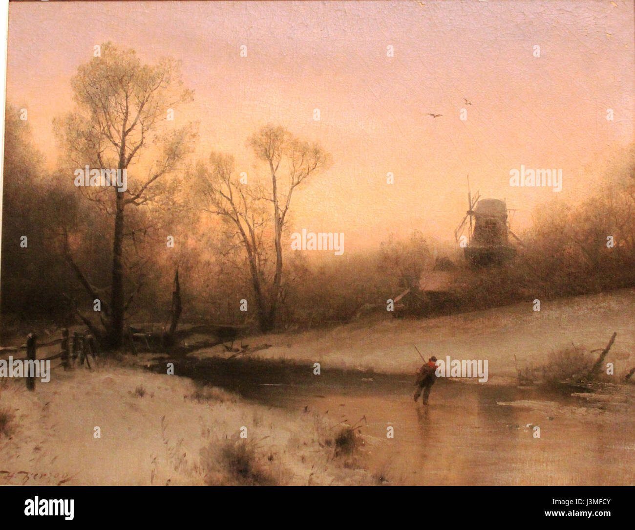 'Winter Evening in Holland' by Herzog depicts a tranquil, wintery scene in the Netherlands. The artwork captures the essence of a Dutch winter landscape, highlighting the cold, still atmosphere. Stock Photo