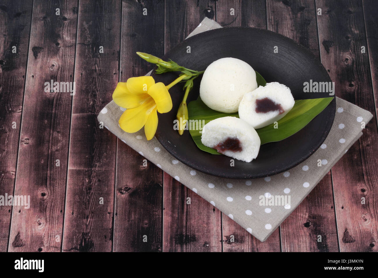 Japanese dessert ,Steamed rice flour cake filling sweet red bean on