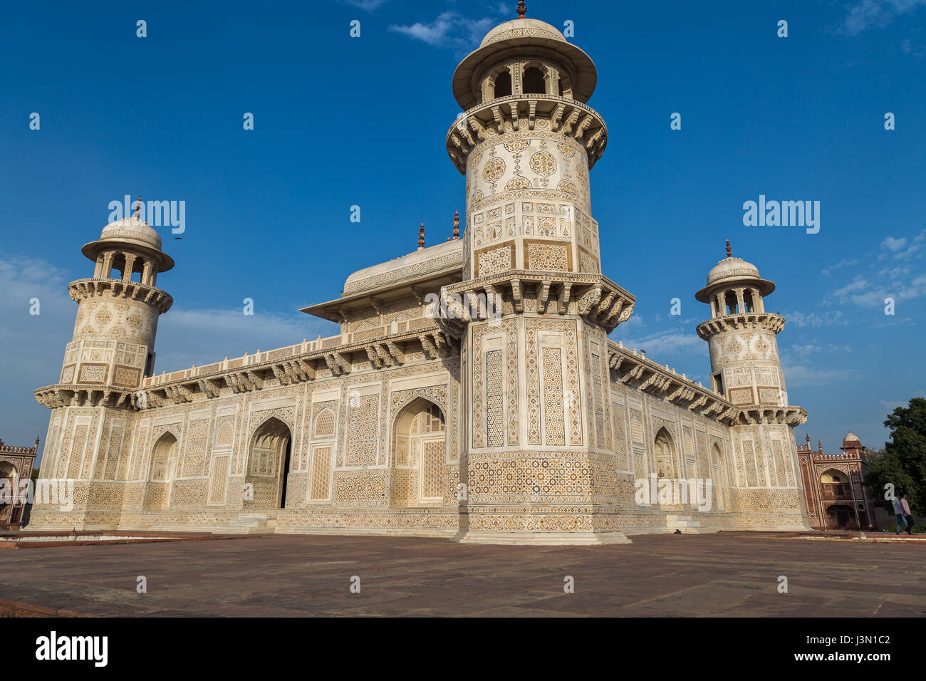 Tomb of Itimad-ud-Daulah also known as the Baby Taj in Agra is a white marble mausoleum with intricate carvings on the exterior and interior. Stock Photo