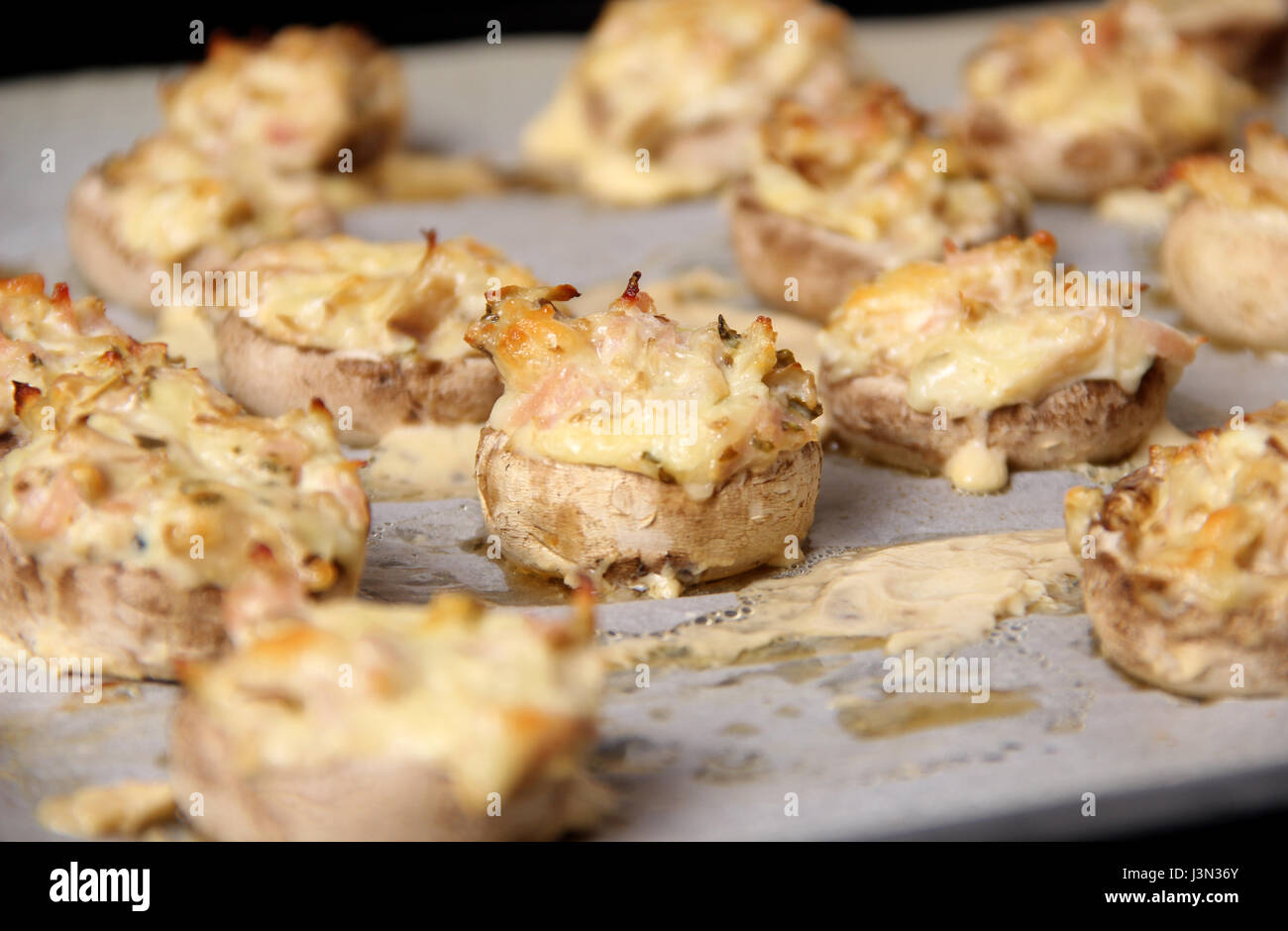 Stuffed button mushrooms Stock Photo - Alamy