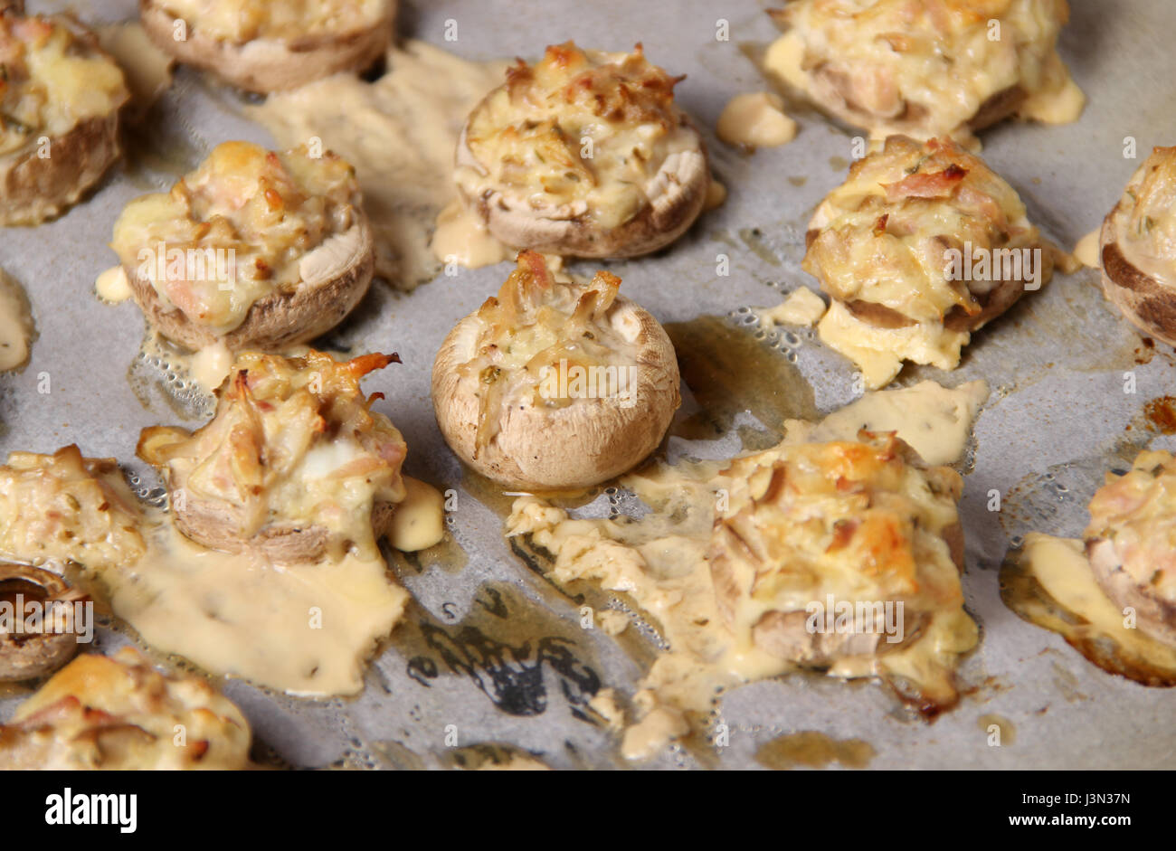 Stuffed button mushrooms Stock Photo - Alamy