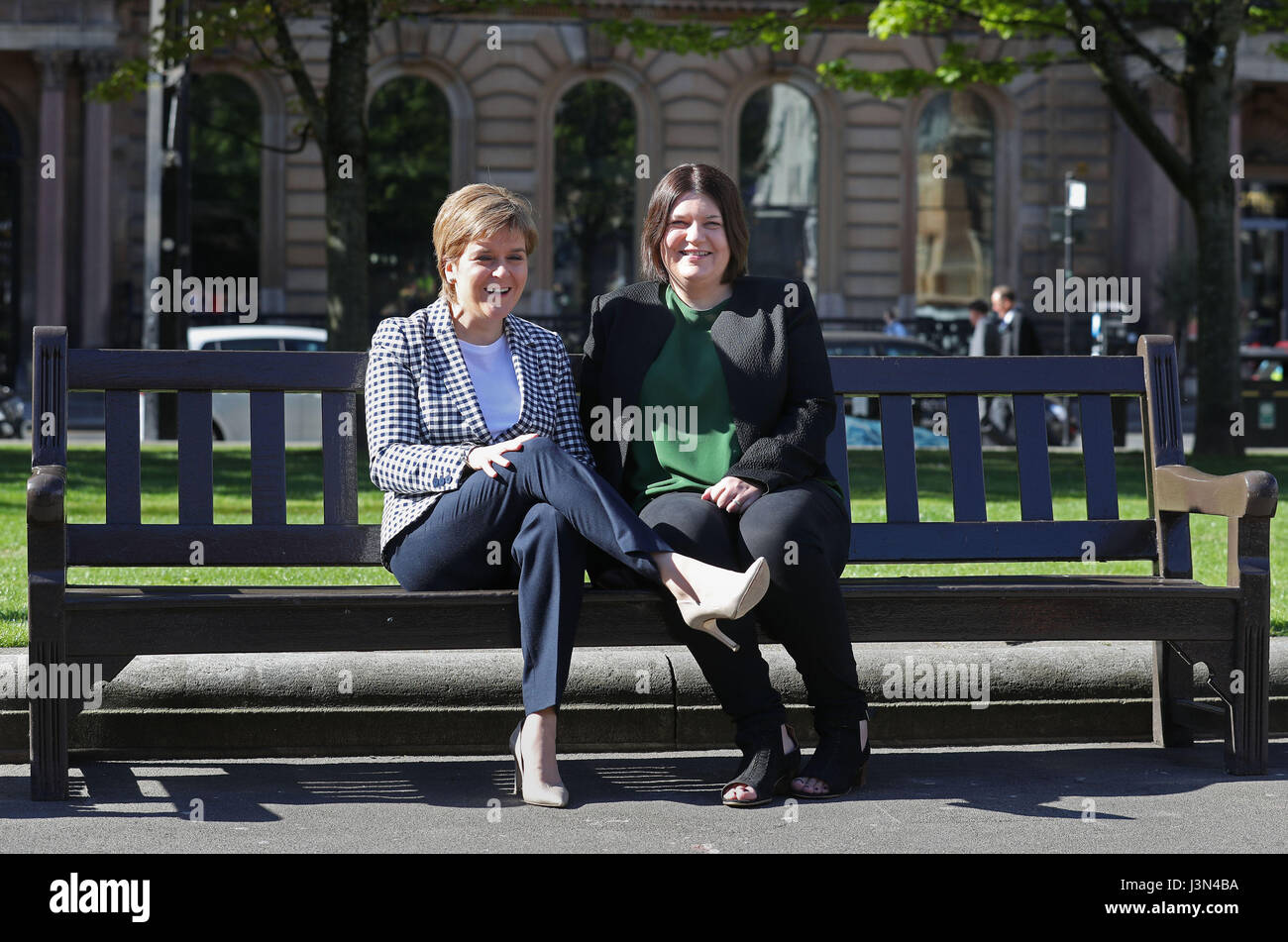 First Minister Nicola Sturgeon (left) with Susan Aitken, the new leader of SNP group on Glasgow City Council at a photo call with the SNP's new council group in Glasgow's George Square to mark the party's victory in the Scottish local elections. Stock Photo