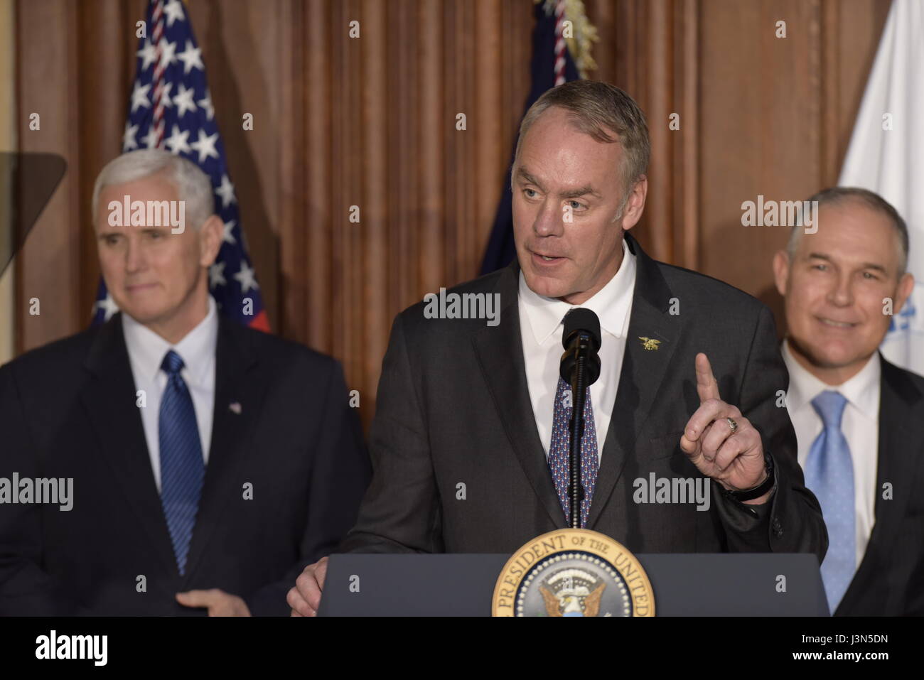 U.S. Interior Secretary Ryan Zinke delivers remarks at a signing ceremony for a series of anti-environmental executive orders aimed at repealing restrictions on coal at the Environmental Protection Agency headquarters March 28, 2017 in Washington, DC. The orders roll back at least 10 major Obama environmental regulations and fulfills a wish list from the fossil fuel industry. Stock Photo