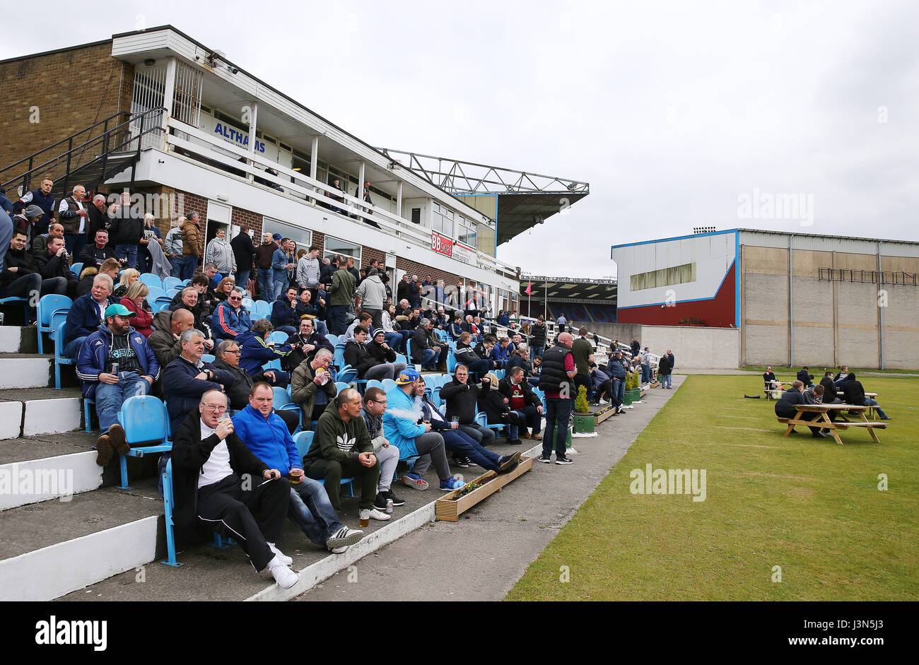 West Bromwich Albion's fans watch a cricket match at Burnley Cricket