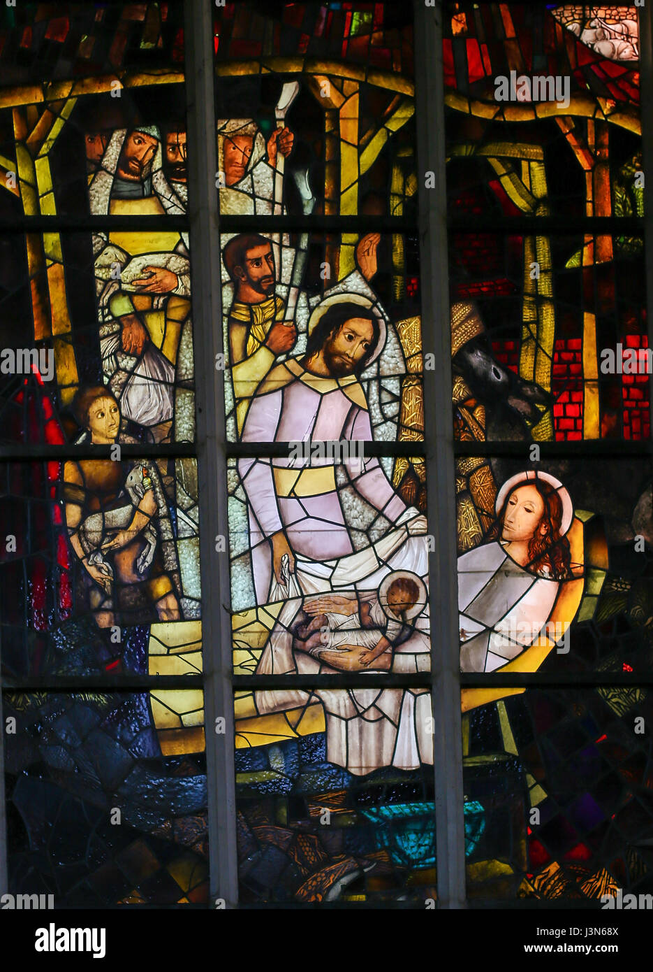 Stained Glass window in the Church of Saint Andrew in Antwerp, Belgium, depicting a Nativity Scene at Christmas Stock Photo
