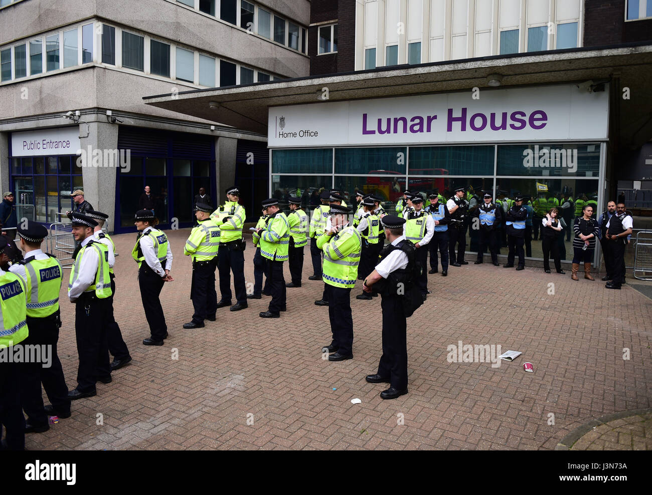 Police monitor two groups of protesters demonstrating for and against