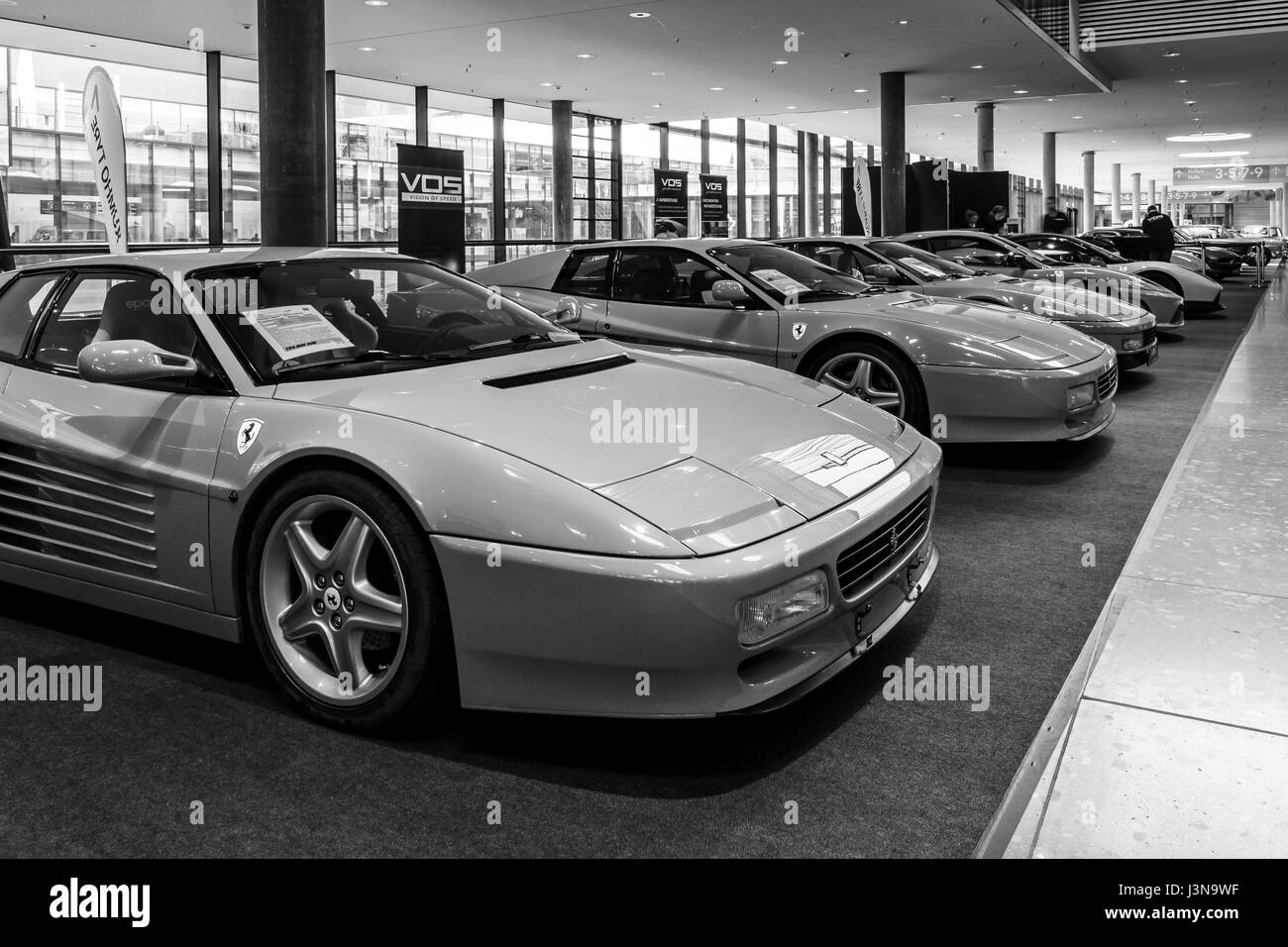 STUTTGART, GERMANY - MARCH 03, 2017: The various modifications of sports cars Ferrari Testarossa and F512 TR. Black and white. Europe's greatest classic car exhibition 'RETRO CLASSICS' Stock Photo