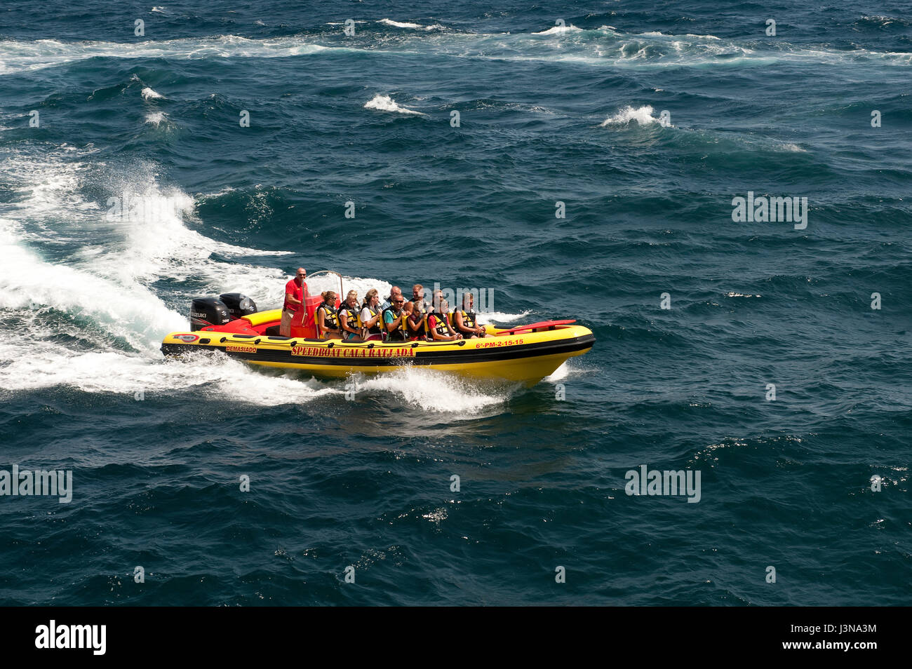 speedboat with tourists, 600 hp engine, high speed, Cala Ratjada, Mallorca, Spain, Europe Mediterranean Stock Photo