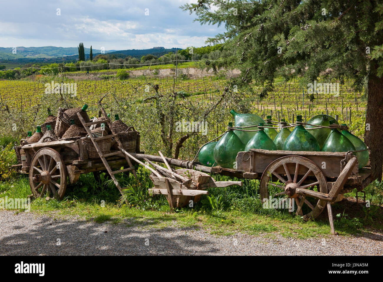 Wooden cart with wine bottles, Villa A Sesta, Chianti, Tuscany, Italy, Europe Stock Photo