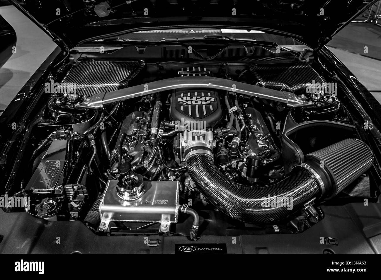 STUTTGART, GERMANY - MARCH 03, 2017: Engine of the Ford Mustang GT 'Warrior' U.S. Army Special Edition, 2014. Close-up. Black and white. Europe's greatest classic car exhibition 'RETRO CLASSICS' Stock Photo