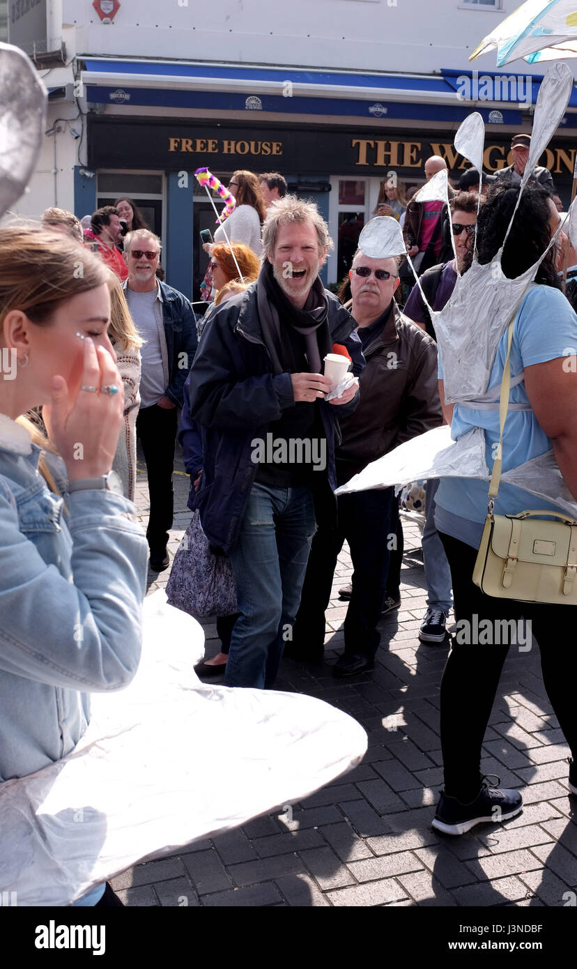 Brighton UK 6th May 2017 - Over 5000 participants enjoy the beautiful sunny weather as they take part in the Brighton Festival Children's Parade interpreting this years theme of Poetry in Motion . The annual procession organised by the Same Sky artsgroup is the traditional opening event of the arts festival with this years guest director being Kate Tempest the poet performer and playwright Photograph taken by Simon Dack Stock Photo