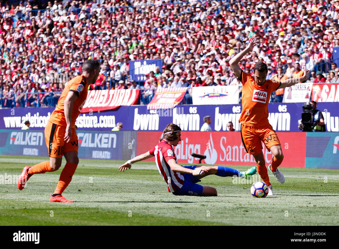 Gonzalo Escalante (5) SD Eibar's player. Filipe Luis Kasmirski (3) Atletico de Madrid's player.La Liga between Atletico de Madrid vs SD Eibar at the Vicente Calderon stadium in Madrid, Spain, May 6, 2017 . Stock Photo