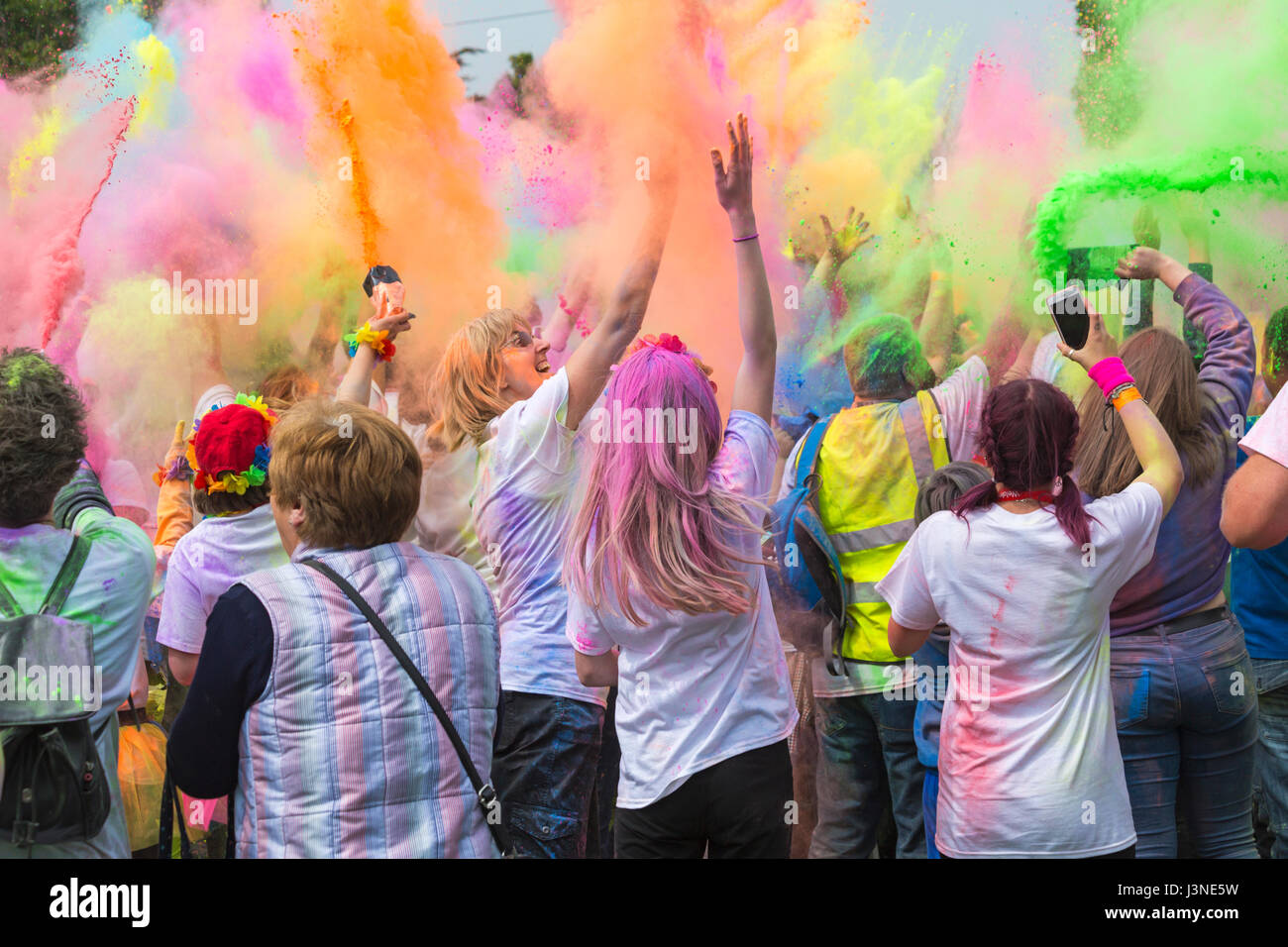 Weymouth, Dorset, UK. 6th May, 2017. Weldmar's Colour Run takes place at Weymouth to raise funds for the charity. Families participate in the event and have fun getting covered in brightly coloured powder paint. Credit: Carolyn Jenkins/Alamy Live News Stock Photo