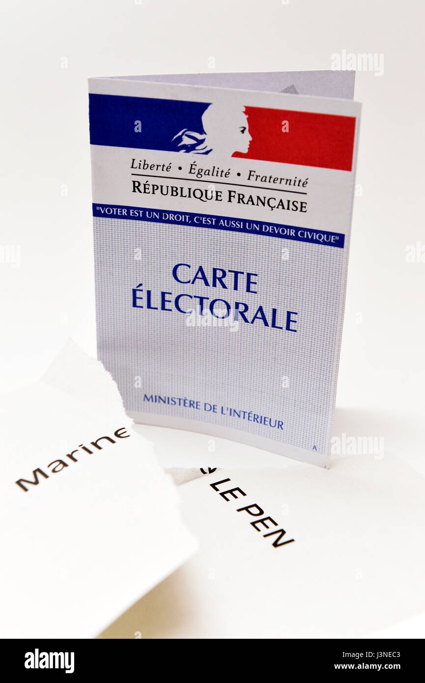 Torn up Marine Le Pen ballot paper with a polling card Stock Photo