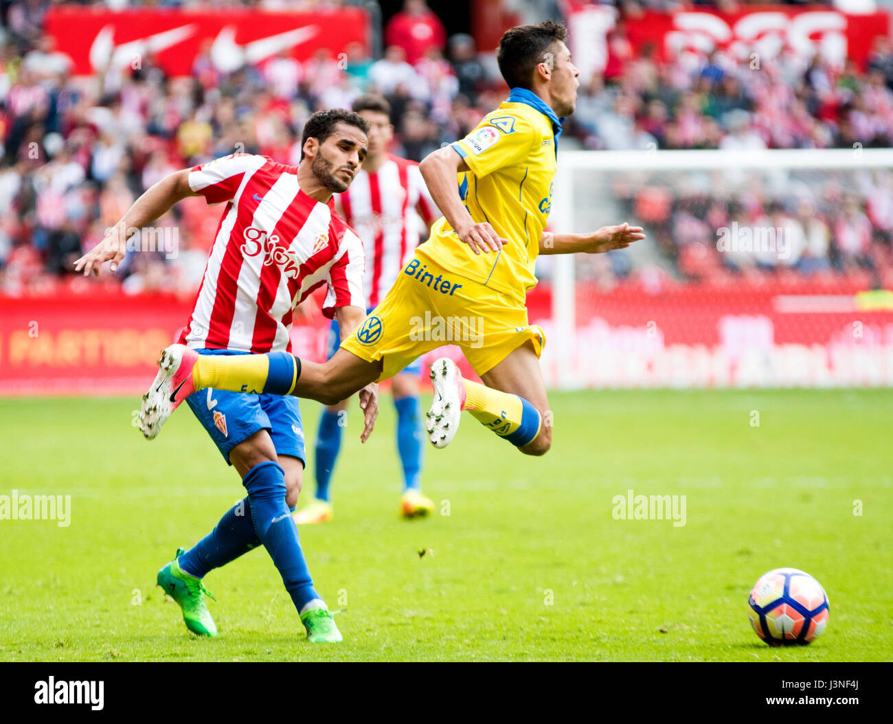 Gijon, Spain. 6th May, 2017. Mateo Garcia (Mildfierder, UD Las Palmas)  falls down after he received a foul from Douglas Pereira (Defender, Sporting  Gijon) during the football match of Season 2016/2017 of