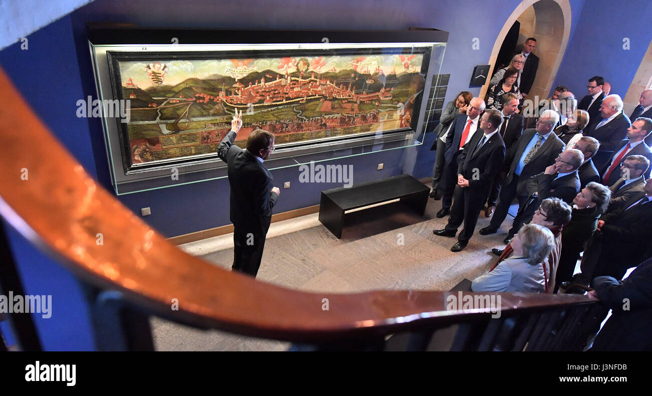 Guenter Schuchardt (L), managing director of Wartburg Castle serves as a guide to guests during a tour at the opening of the national special exhibition 'Luther und die Deutschen' (lit. Luther and the Germans) marking the 500th anniversary of the Protestant Reformation at Wartburg Castle in Eisenach, Germany, 03 May 2017. The exhibition includes some 300 exhibits over more than 1,000 square metres and outlines the cultural and intellectual impact of Luther's Protestant teachings and his translation of the New Testament into the German language. Photo: Martin Schutt/dpa-Zentralbild/dpa Stock Photo