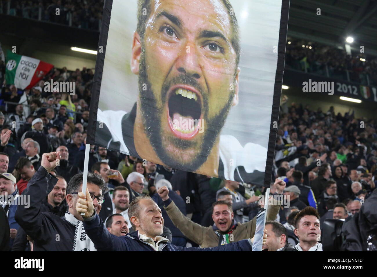 Turin, Italy. 6th May, 2017. A banner depicting Gonzalo Higuain exposed by Juventus fans after the goal of the draw scored by the Argentine striker during the Serie A football match between Juventus FC and Torino FC  at Juventus Stadium on may 06, 2017 in Turin, Italy. Credit: Massimiliano Ferraro/Alamy Live News Stock Photo