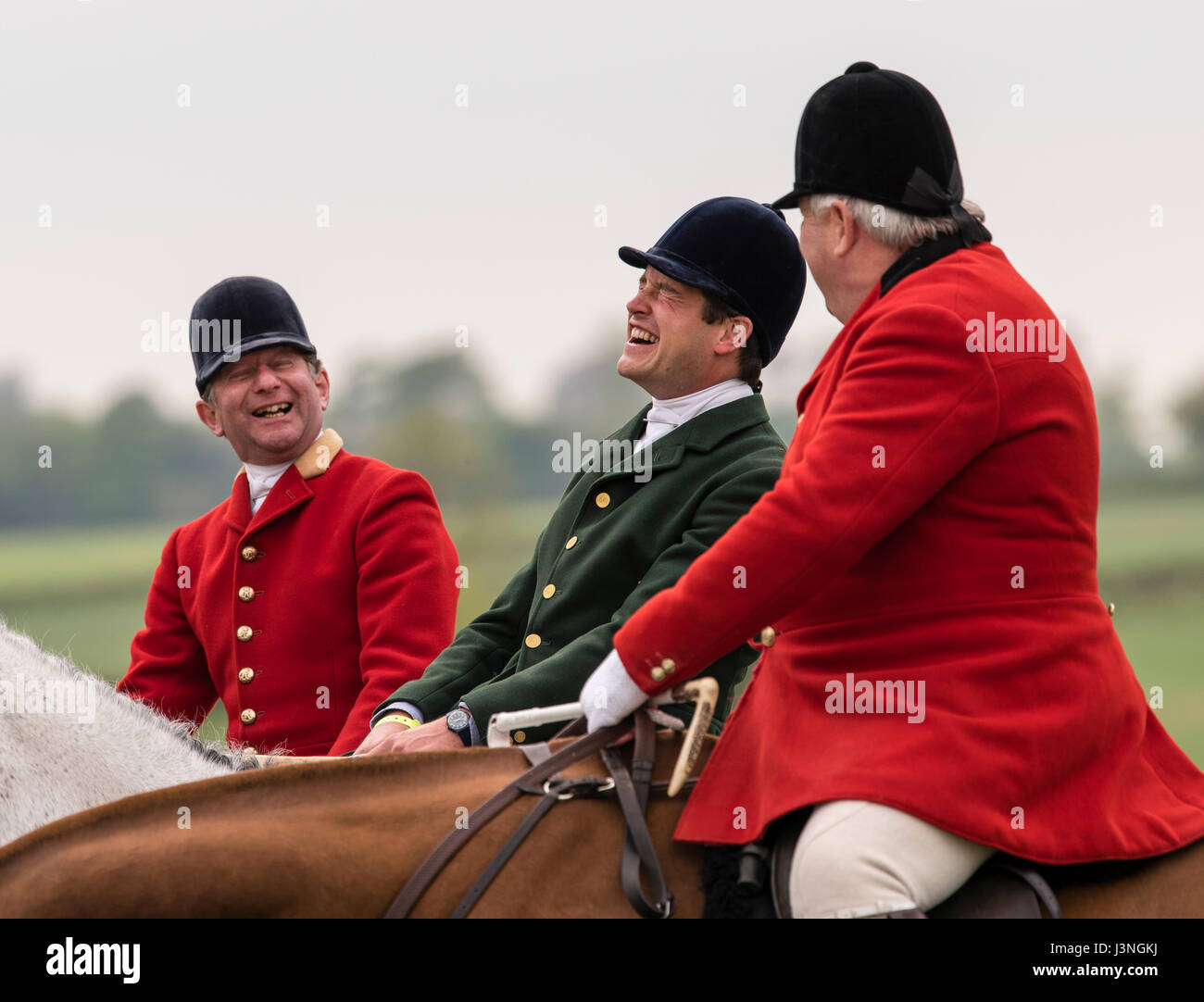 Badminton, England.  6th May 2017.  Huntsmen at Badminton Horse Trials share a joke. Credit: Steven H Jones/Alamy Live News Stock Photo