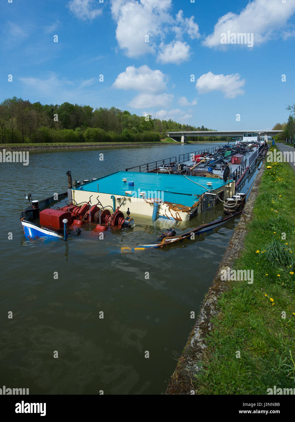 Bad Bodenteich, Germany. 7th May, 2017. A tankship fills up with water after a collision with another ship on a side canal of Elbe river in Bad Bodenteich, Germany, 7 May 2017. The two ships crashed into each other head-on. One of the ship sank half-way. Photo: Philipp Schulze/dpa/Alamy Live News Stock Photo
