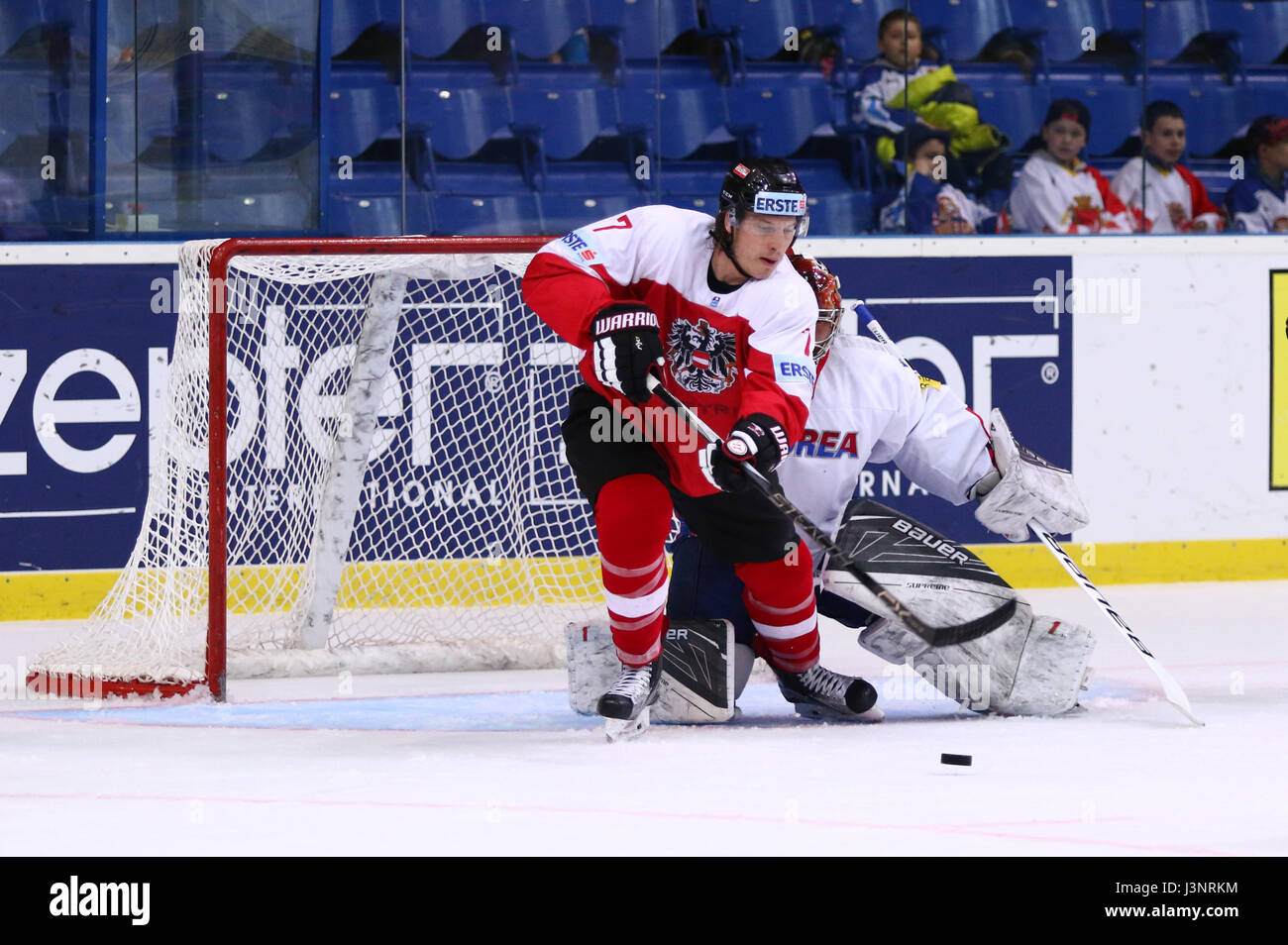 KYIV, UKRAINE - APRIL 27, 2017: Forward Brian LEBLER of Austria and goalkeeper PARK Sungje of South Korea in action during their IIHF 2017 Ice Hockey  Stock Photo