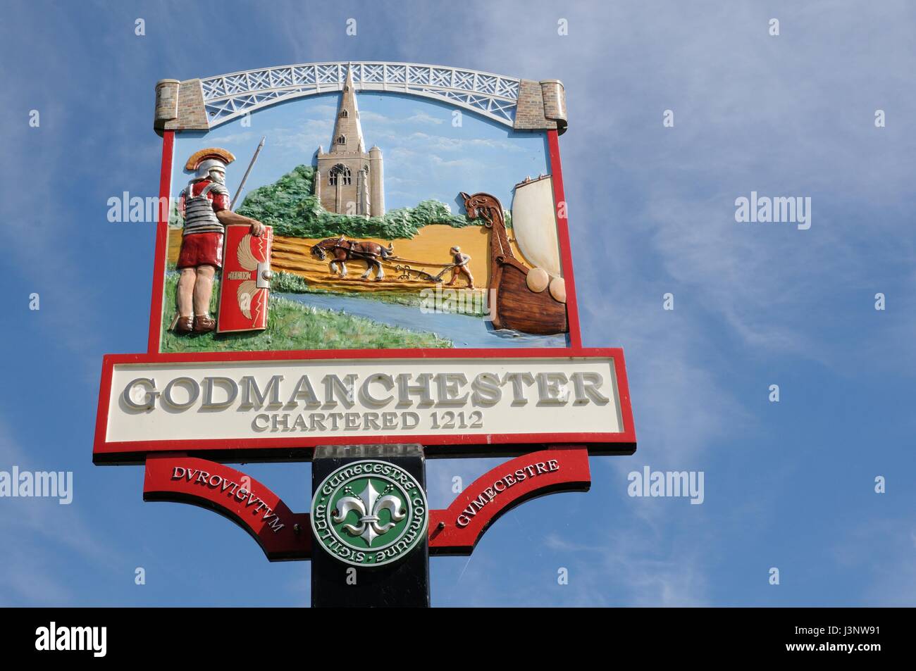 Town sign, Godmanchester, Cambridgeshire. The sign displays a Roman soldier from the IX Legion Hispana,and  the Chinese Bridge Stock Photo