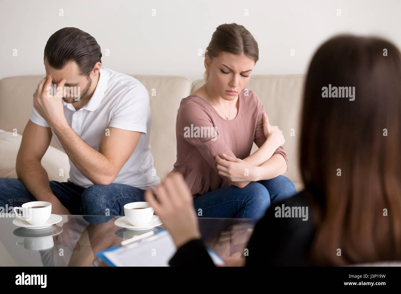 Family therapy, couple after argument not talking to each other Stock Photo