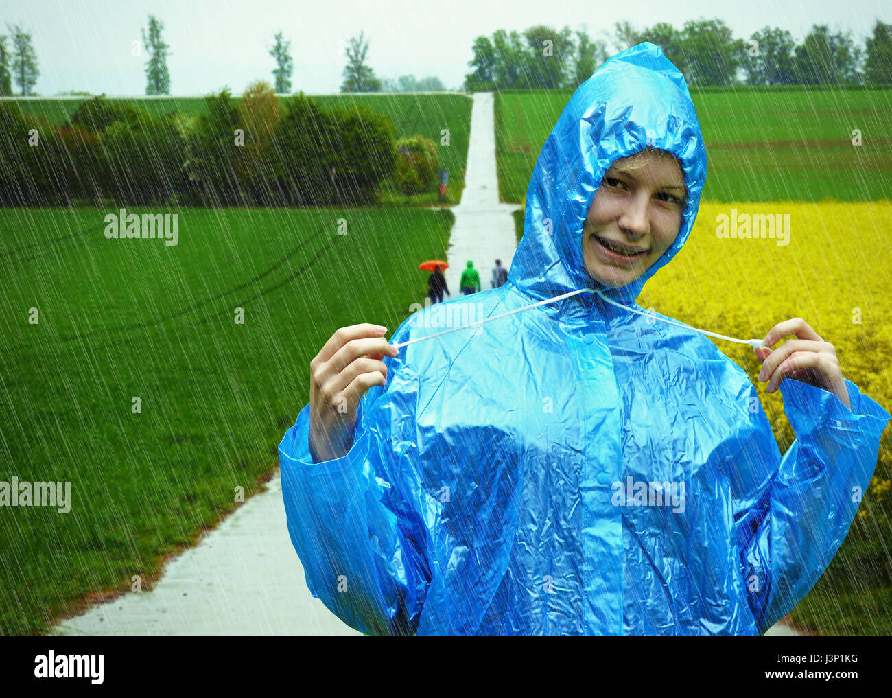 Happy girl on a rainy day Stock Photo