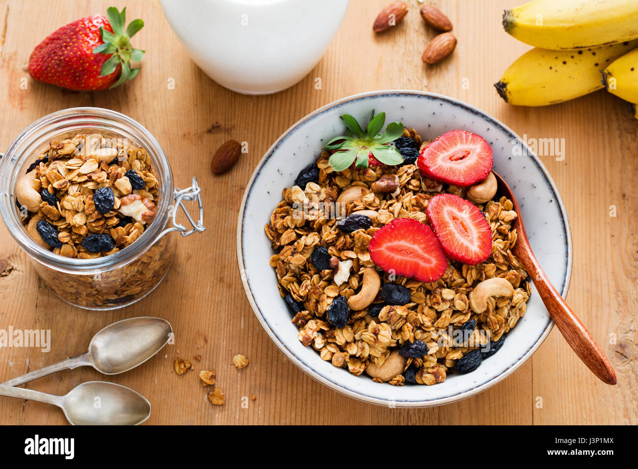Granola, milk and fruits. Tasty and healthy breakfast bowl of granola