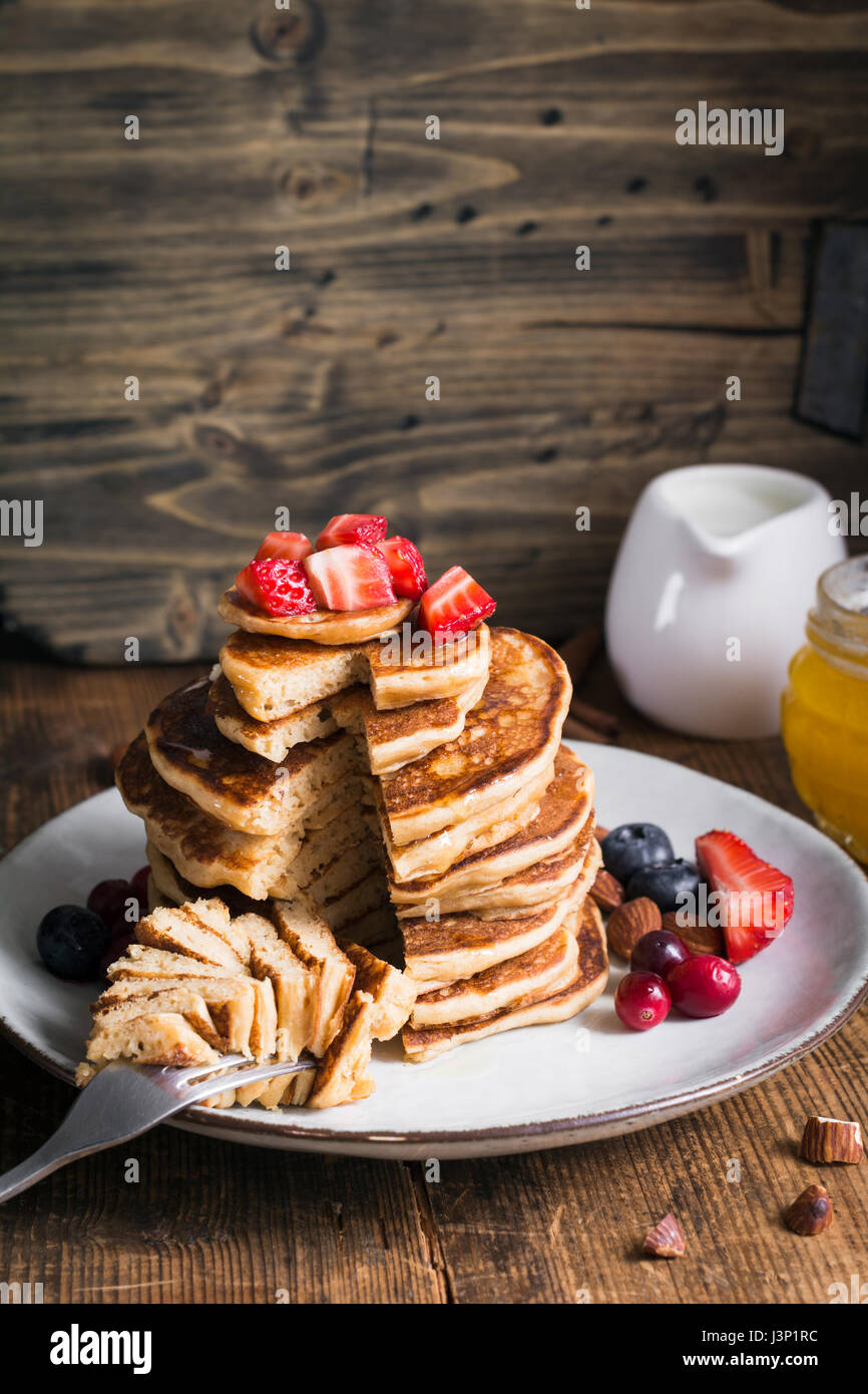 Healthy pancakes. Stack of delicious healthy whole grain pancakes with