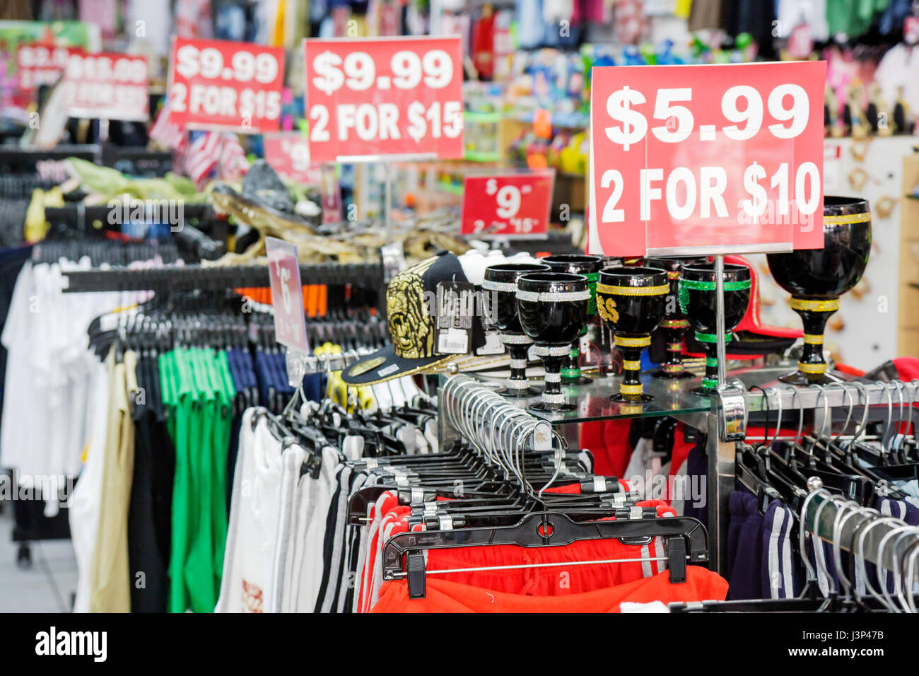 Miami Florida,Flagler Street,retail store,small  business,liquidation,clothing,apparel,accessories,hangers,sale,signs,prices,bargains,shopping  shopper Stock Photo - Alamy