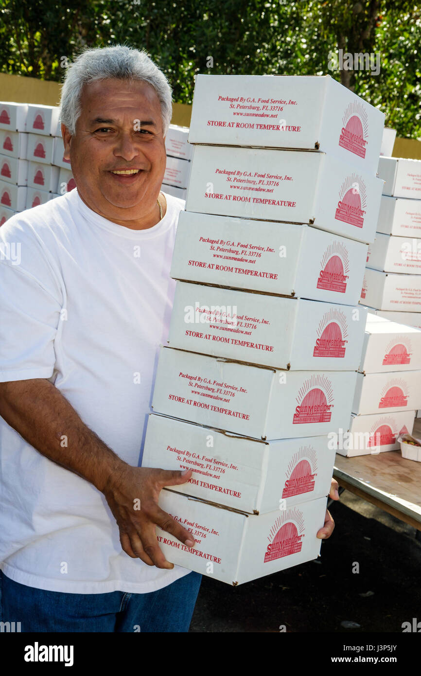 Miami Florida,Alpha Omega Church,Christian,religion,Thanksgiving turkey give away,free,food,needy,volunteer volunteers volunteering work worker worker Stock Photo