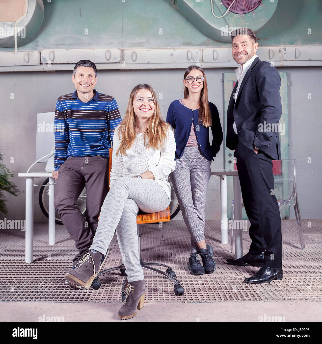 portrait of a group of young businesspeople in a new office Stock Photo ...