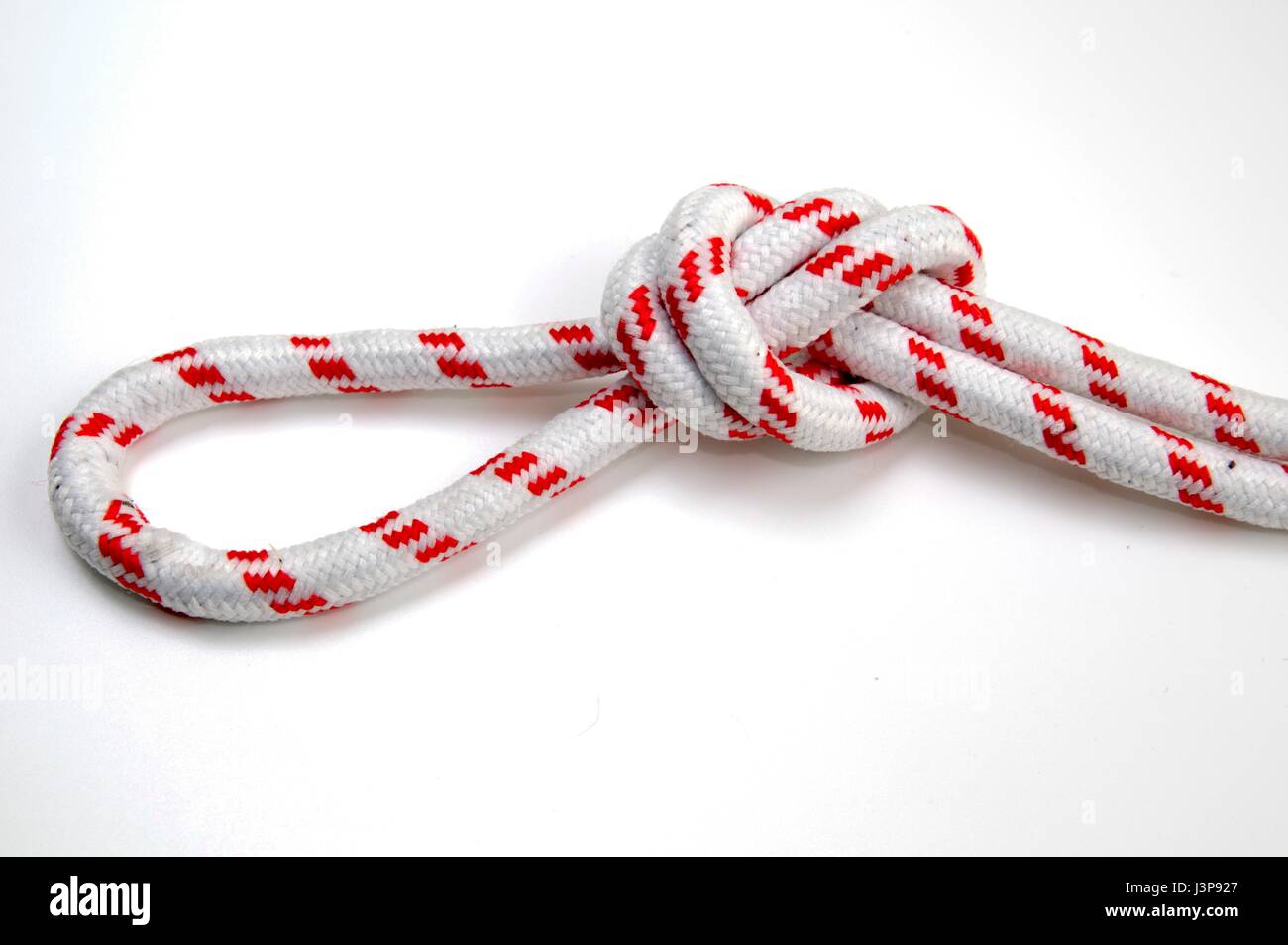 Overhand loop knot in a rope. Stock Photo