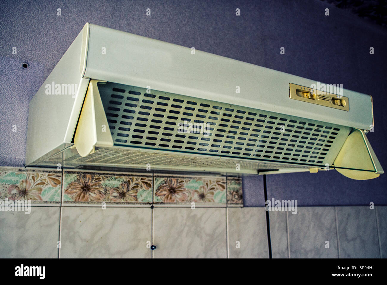 Old cooker hood in the kitchen with poor repair Stock Photo Alamy