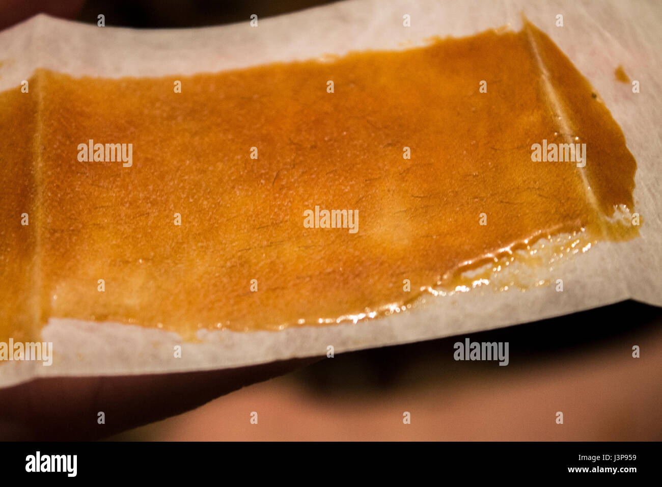 Used wax strips with hairs on wax Stock Photo Alamy