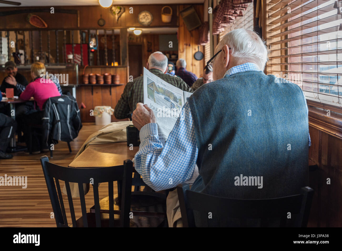 old-man-reading-a-newspaper-hi-res-stock-photography-and-images-alamy