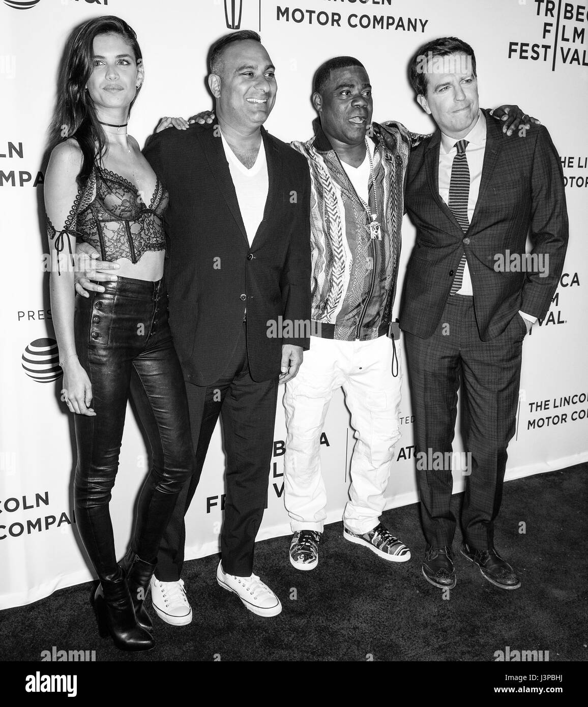 NEW YORK, NY - APRIL 23, 2017: (L-R) Sara Sampaio, Russell Peters, Tracy Morgan and producer Ed Helms attend 'The Clapper' Premiere during the 2017 Tr Stock Photo