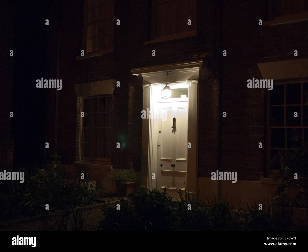Home Front Door Open Night High Resolution Stock Photography and Images