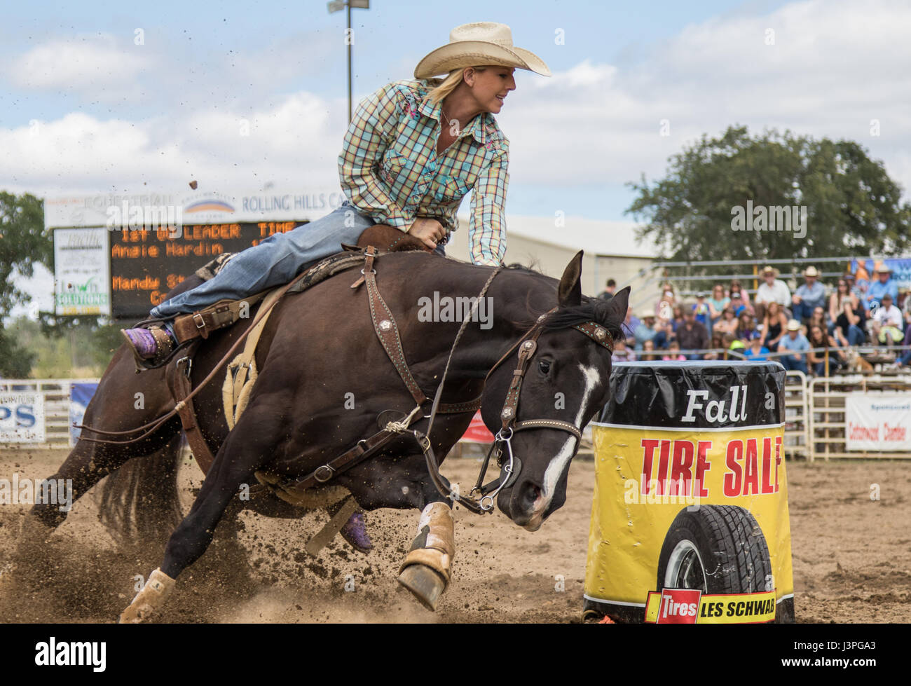 Barrel racing action at the rodeo in Cottonwood, California Stock Photo ...