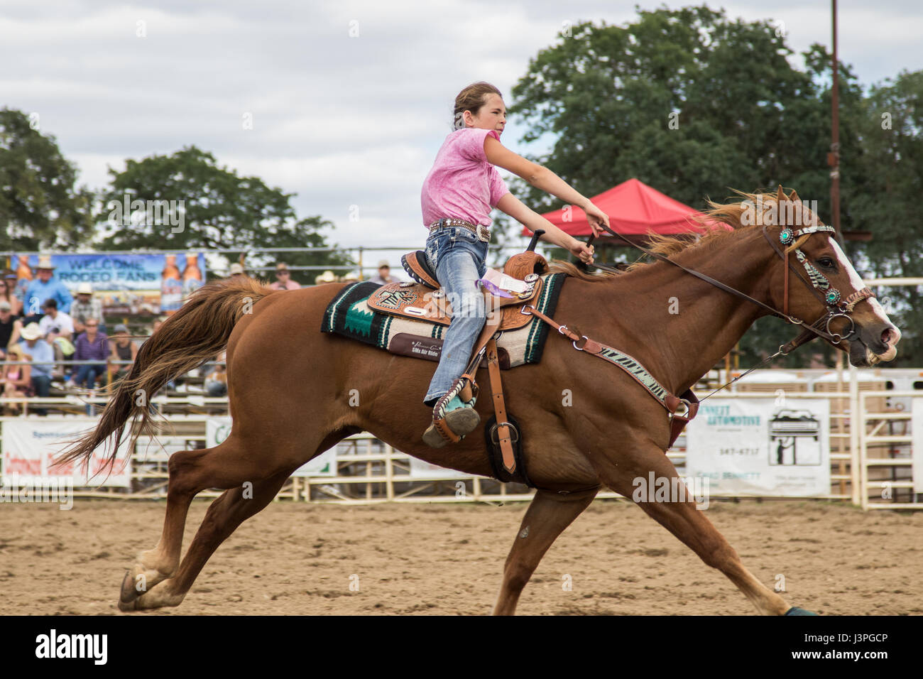 Barrel racing action at the rodeo in Cottonwood, California Stock Photo