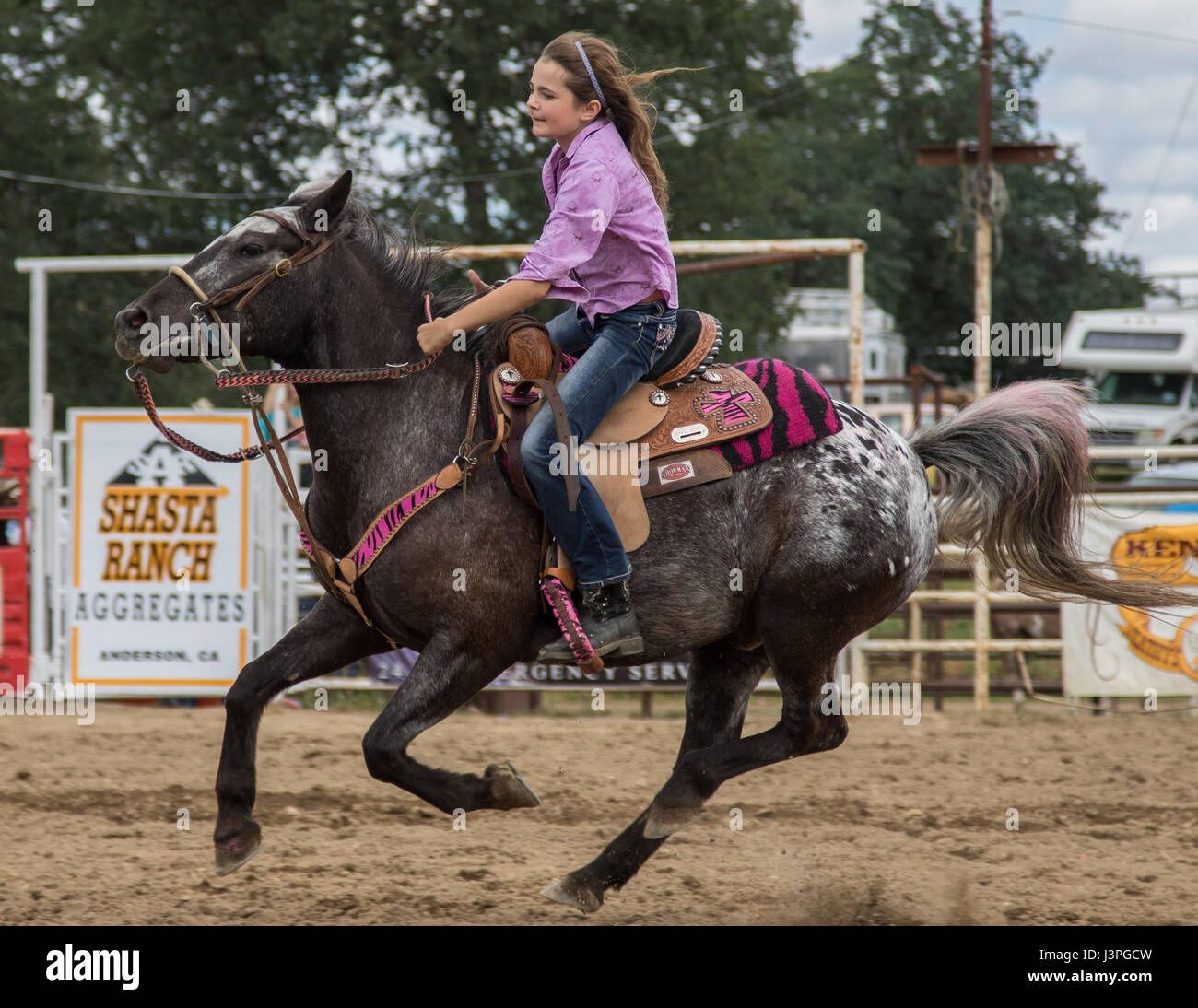 Barrel racing action at the rodeo in Cottonwood, California Stock Photo ...