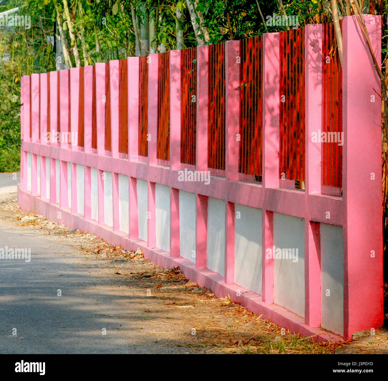 beautiful pink painting on cement wall fence Stock Photo - Alamy
